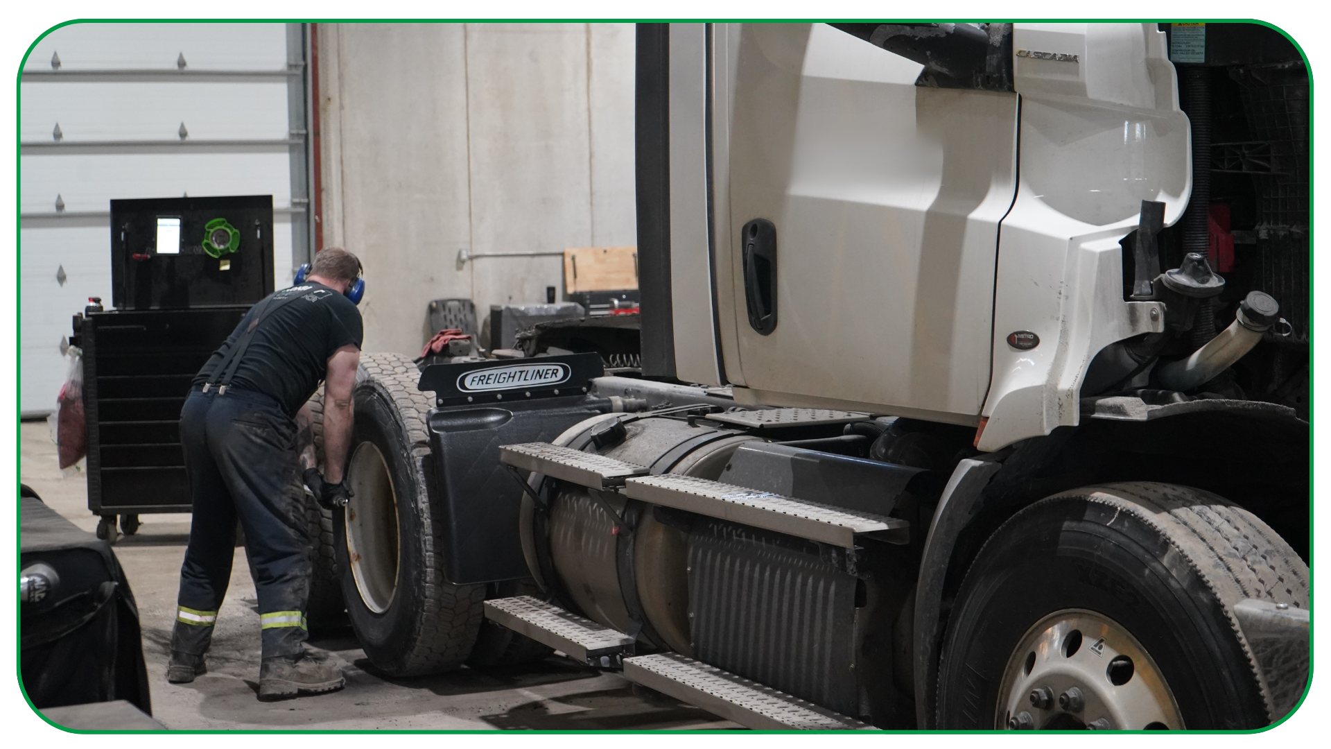 Goright technician repairing tire on transport truck